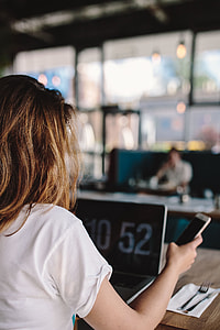 Young woman working in a cafe thumbnail