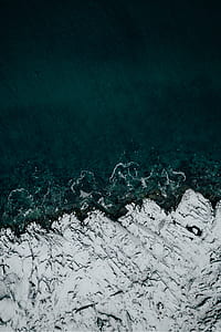 bird's-eye view of blue body of water thumbnail