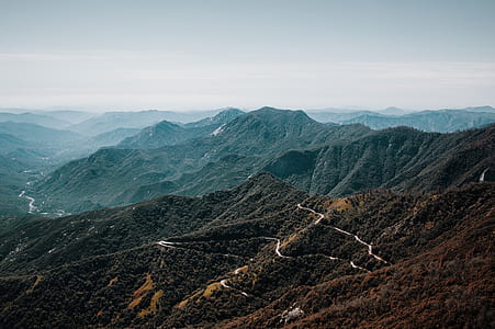 photo of rocky mountains during daytime thumbnail
