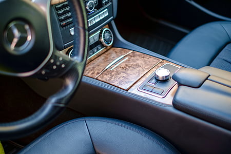 brown and black vehicle center console thumbnail