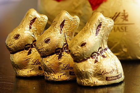 three gold rabbit figurines thumbnail