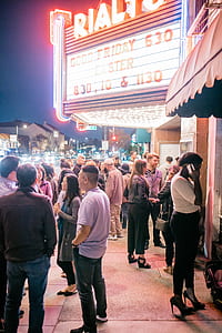 people standing in front of cinema thumbnail