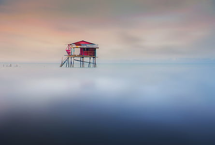 photo of red and brown beach house thumbnail