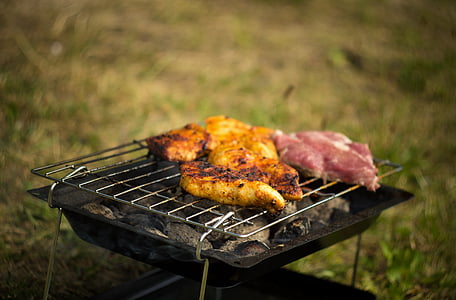 roasted meat on gray steel grill thumbnail