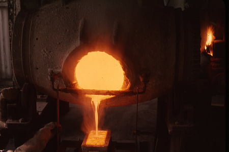 melting metal on gray steel container thumbnail
