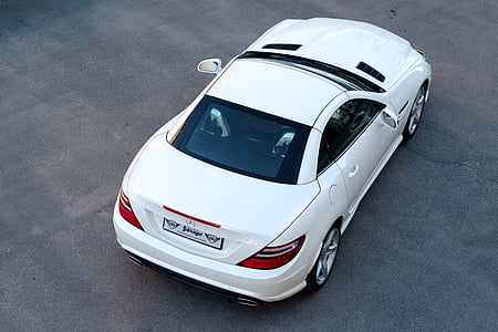 white Mercedes-Benz coupe thumbnail