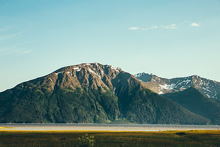 mountain view under sunny sky thumbnail