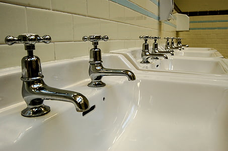 lined gray white sinks with gray faucets thumbnail
