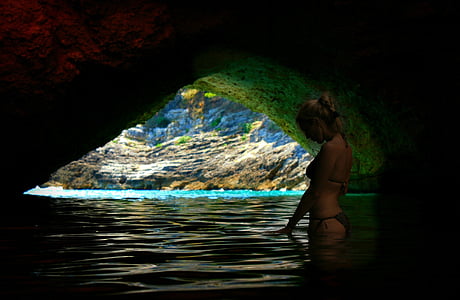 woman on beach cave thumbnail