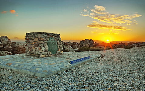 pebble stone tomb during golden hour thumbnail