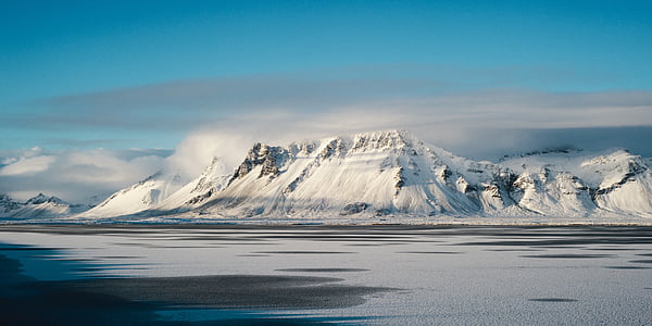 body of water and mountain scenery thumbnail