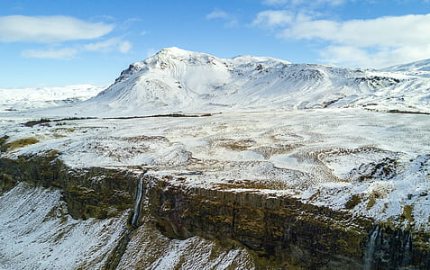 snowy mountain under blue sky thumbnail