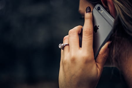 closeup photo of a woman taking a call thumbnail