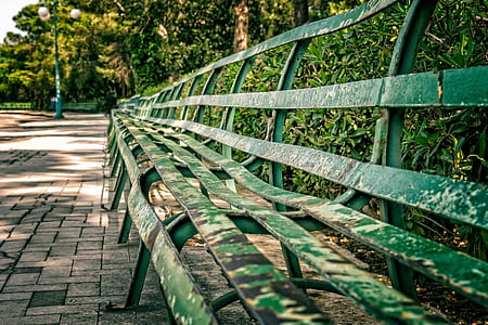 vacant green metal benches thumbnail
