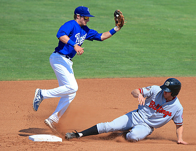 two baseball player in field photo thumbnail
