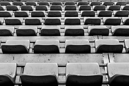 empty gray seat lot at daytime thumbnail