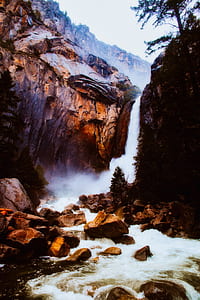 waterfalls between two rock formations thumbnail