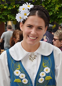 woman wearing white top smiling thumbnail