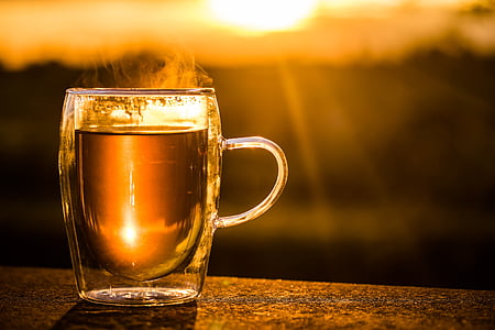 selective focus photography of clear glass cup thumbnail