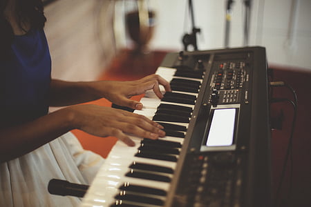 woman playing piano thumbnail