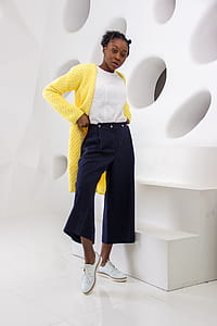 Woman With Yellow Cardigan and Black Pants thumbnail