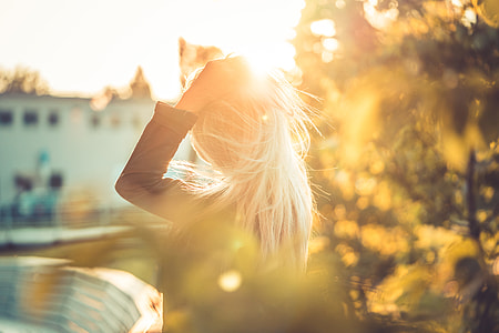Young Woman Emotionally Touching Her Hair thumbnail