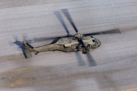 military chopper on land thumbnail