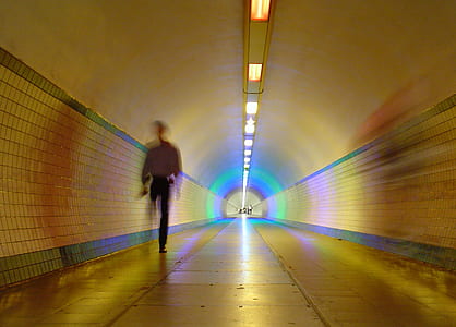 person walking inside tunnel thumbnail