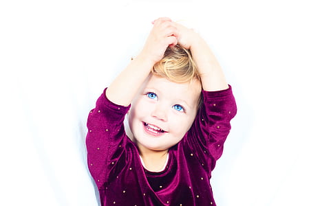 child in purple 3/4-sleeved shirt thumbnail
