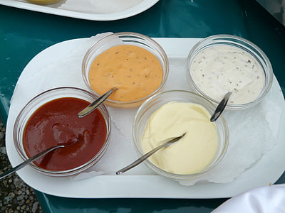 four assorted dipping on clear glass bowls thumbnail