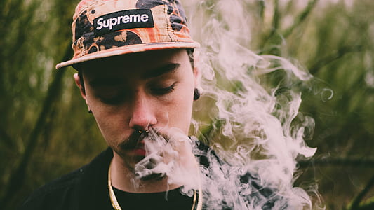 close-up photo of man smoking thumbnail