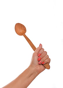 person holding brown wooden spoon thumbnail
