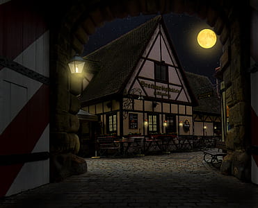 white and black painted building during nighttime thumbnail