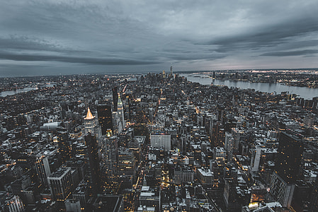 aerial photography of buildings near sea thumbnail