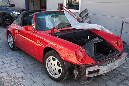 red classic Porsche 311 with missing hood thumbnail