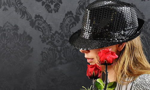 person wearing sequined black fedora hat thumbnail