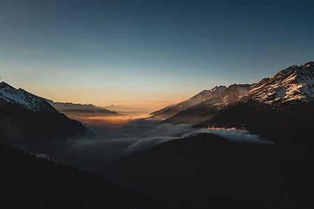aerial photo of mountains during golden hour thumbnail