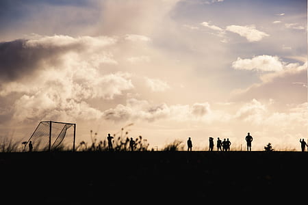silhouette photo of person in soccerfield thumbnail