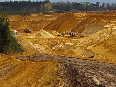 heavy equipment vehicles on mining site thumbnail