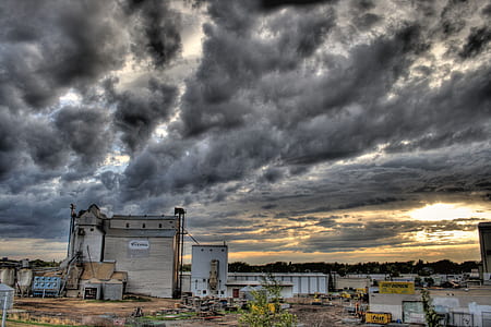 white buildings under gray sky at daytime thumbnail