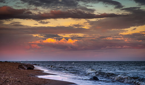 landscape photography of seashore under golden hour thumbnail