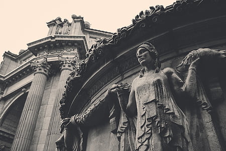 low angle view of woman building sculpture thumbnail