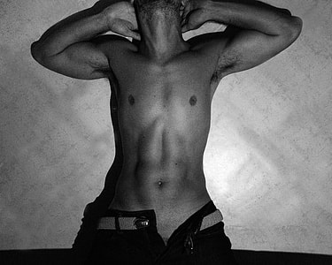 topless man raising both hands thumbnail