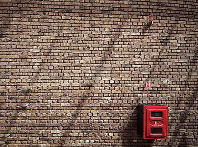 red box hang on brick walls thumbnail