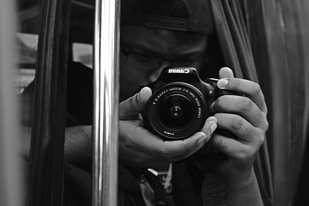 man using camera thumbnail
