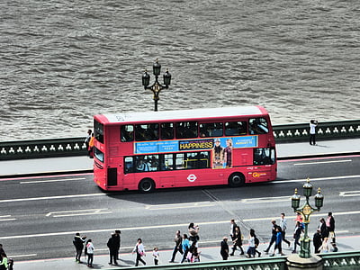 red double-decker bus on raod thumbnail