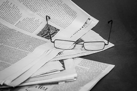 eyeglasses on newspaper thumbnail