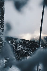 snow mountain under cloudy sky during daytime thumbnail