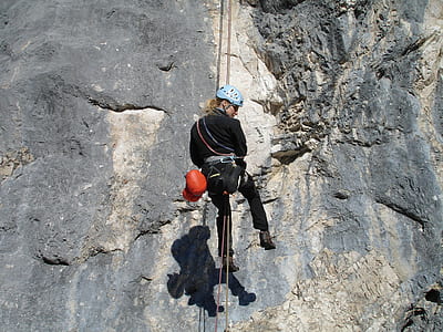 person climbing mountain thumbnail