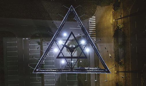 architectural photography of triangular building thumbnail